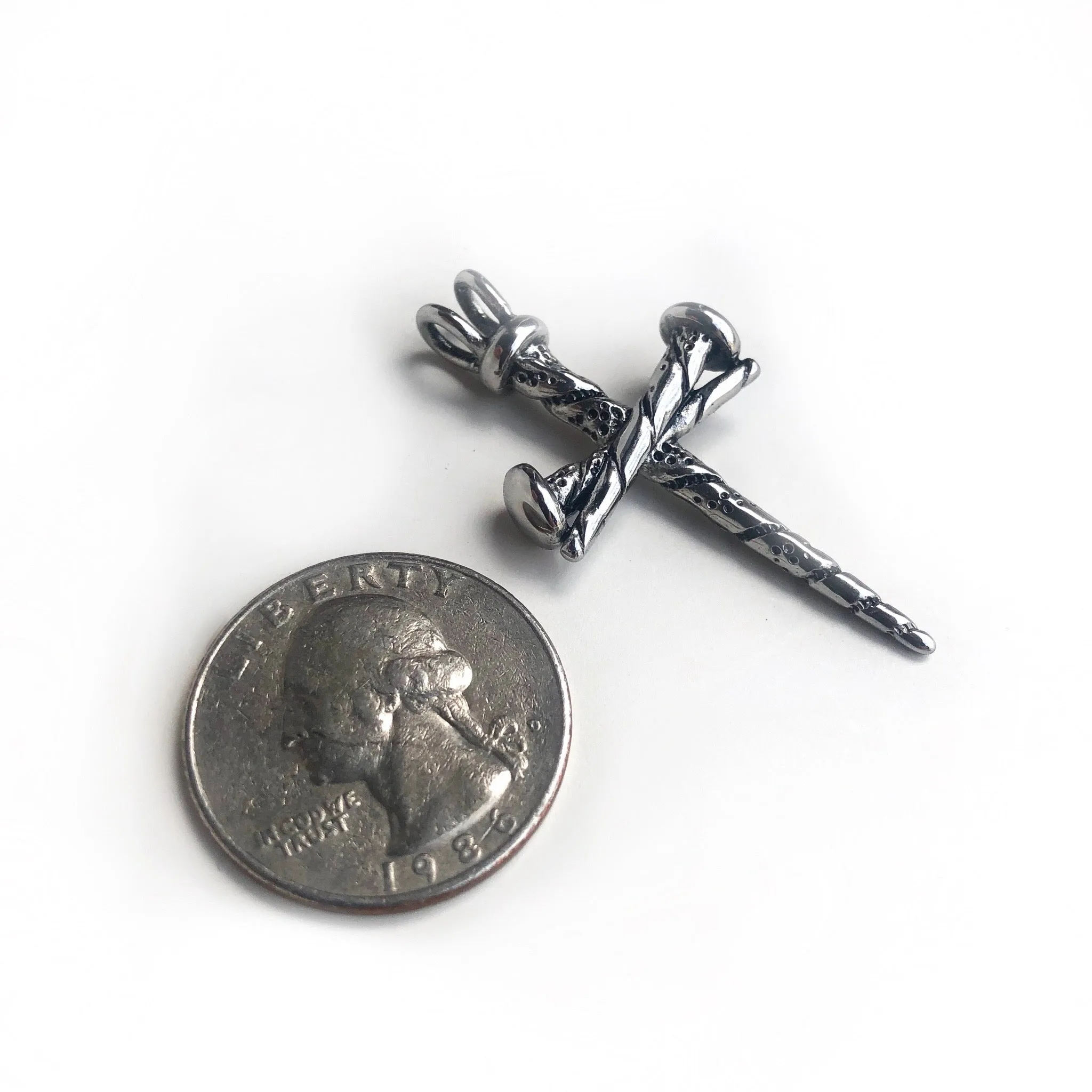 Cross nail Pendant